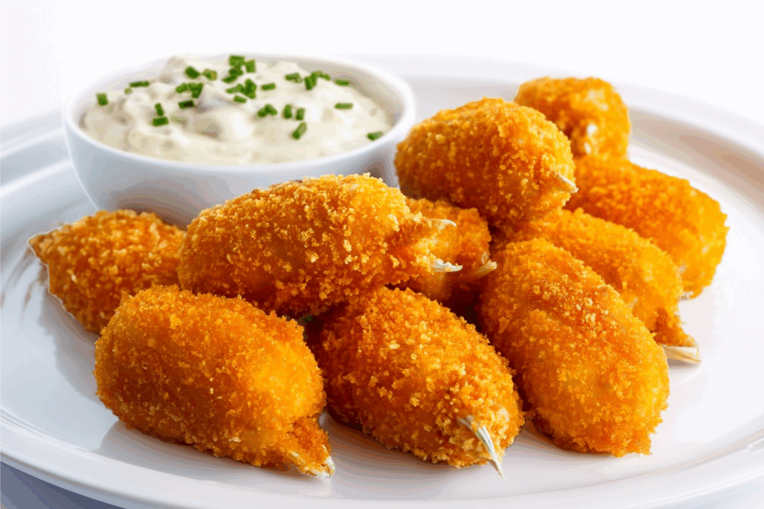 Fried muslitos on a plate. Imported by Thalassa Seafoods
